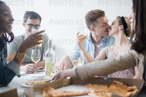 Friends enjoying pizza