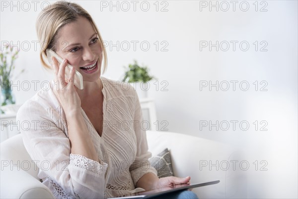 Caucasian woman talking on cell phone