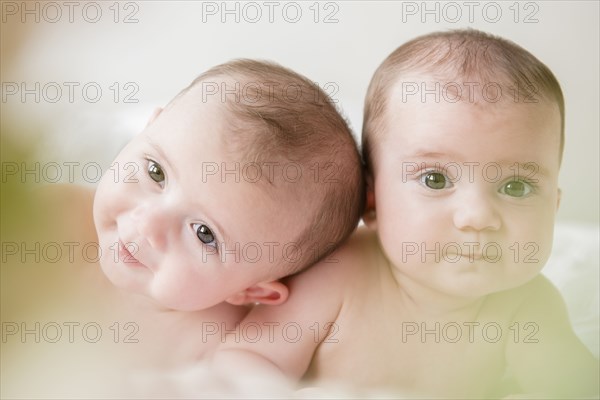 Portrait of Caucasian twin baby girls