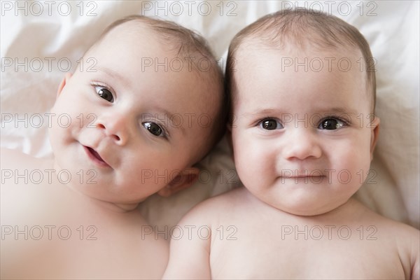 Portrait of Caucasian twin baby girls
