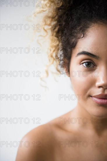 Portrait of Mixed Race woman with bare shoulders