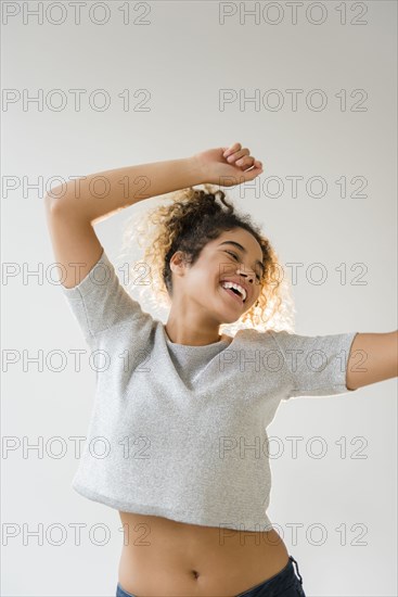 Mixed Race woman dancing