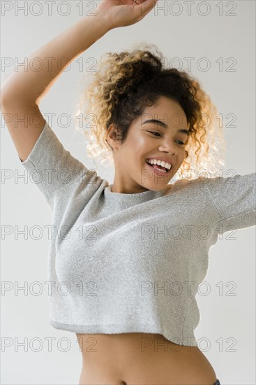 Mixed Race woman dancing