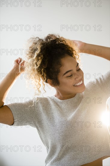 Mixed Race woman dancing