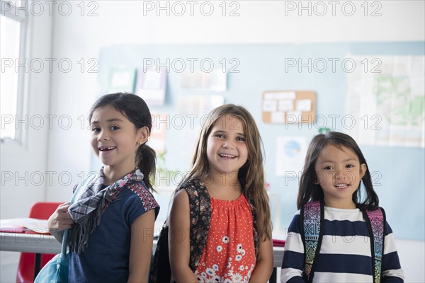Portrait of girls smiling in classroom