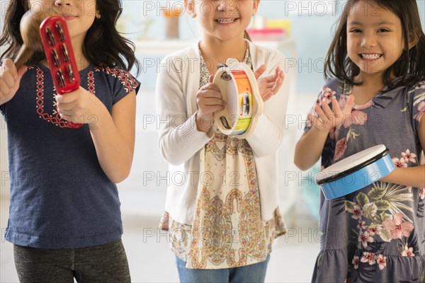 Girls playing music in school