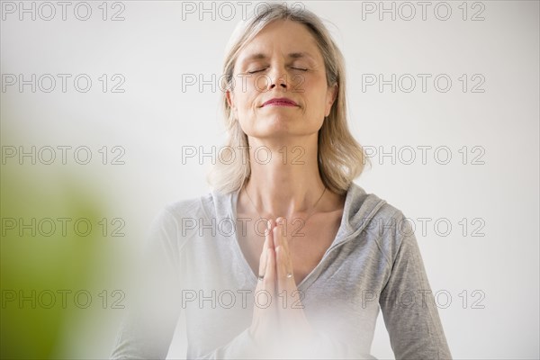 Caucasian woman meditating