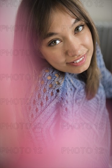 Portrait of smiling Mixed Race woman