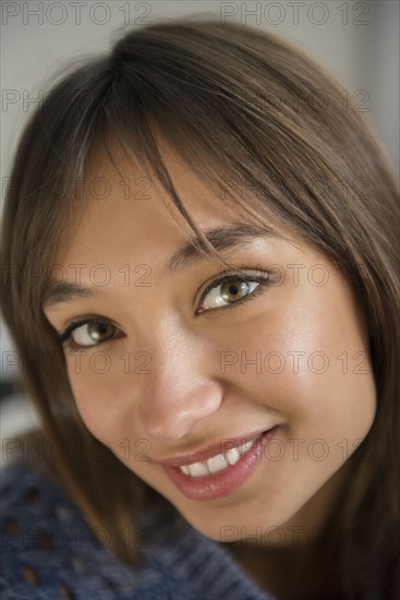 Portrait of smiling Mixed Race woman