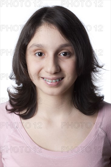 Smiling mixed race teenager in braces