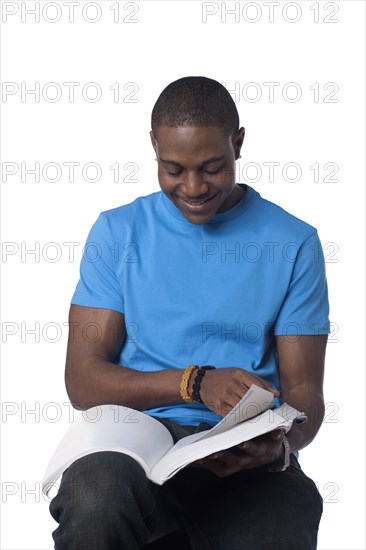 Black man reading book