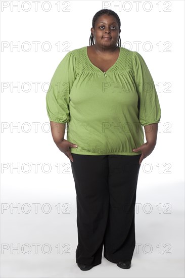 "Smiling, overweight African American woman"