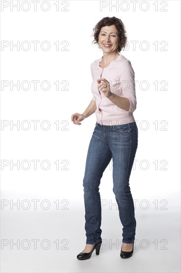 Smiling woman dancing