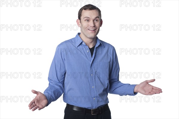 Caucasian man with arms outstretched