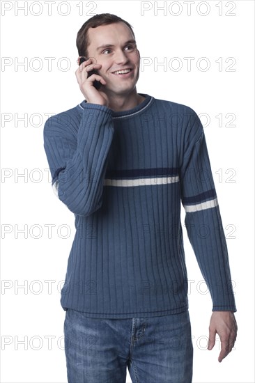 Caucasian man talking on cell phone