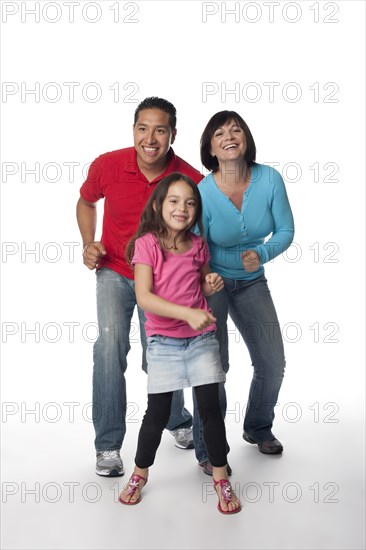 Smiling family dancing