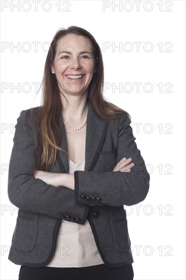 Caucasian businesswoman with arms crossed