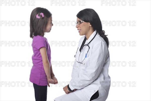Doctor talking to girl