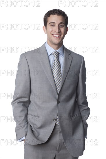 Caucasian businessman with hands in pockets
