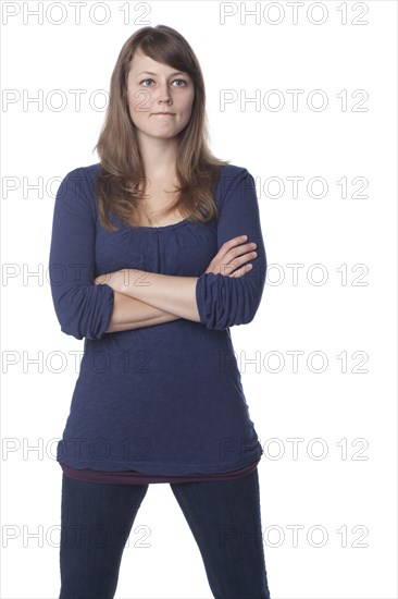 Serious Caucasian woman with arms crossed