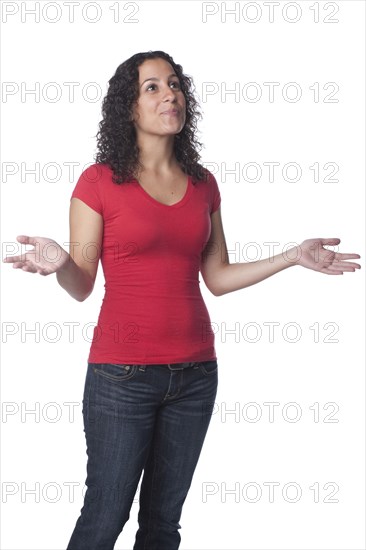 Smiling Caucasian woman with hands outstretched