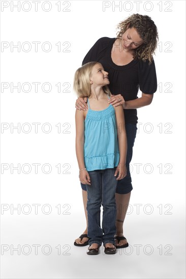 Caucasian mother looking at daughter