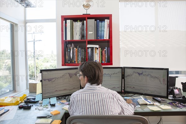 Caucasian businessman working in home office