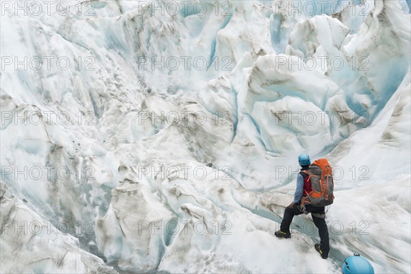 People hiking on glacier