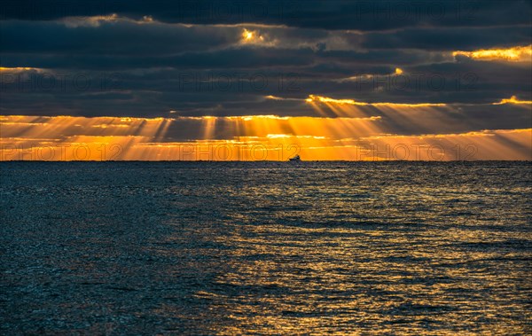 Sunrays and golden clouds