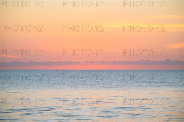 Calm sea at sunrise