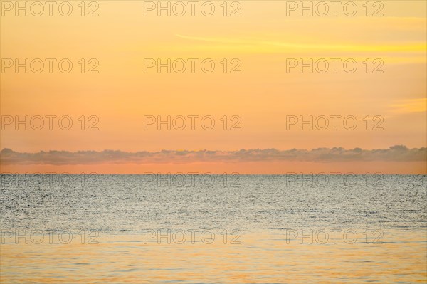 Calm sea at sunrise