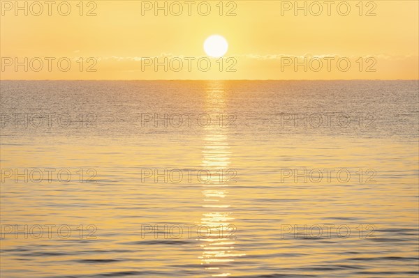 Calm sea at sunrise