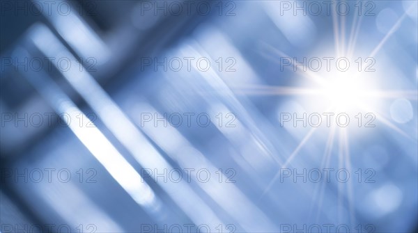 Abstract blue background of blurred lines and star burst