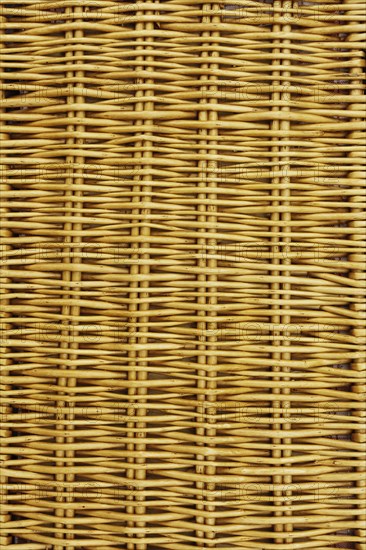 Close-up of closed wicker picnic basket
