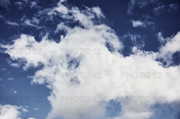 White clouds against blue sky