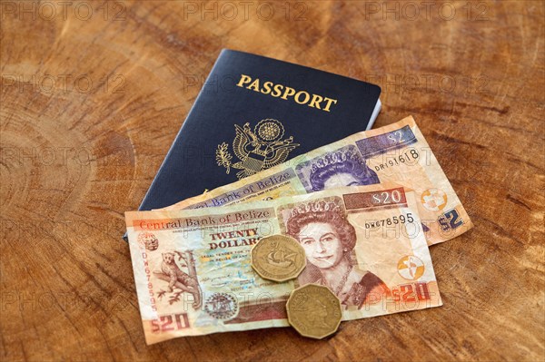 Passport and Belizian currency