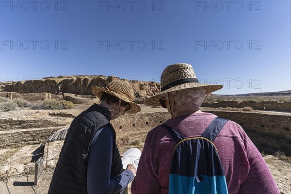 Rear view of two women