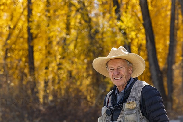 Portrait of smiling senior fisherman