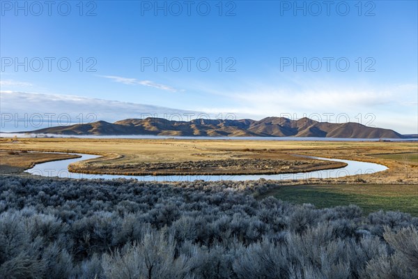 Oxbow shape in spring creek in landscape