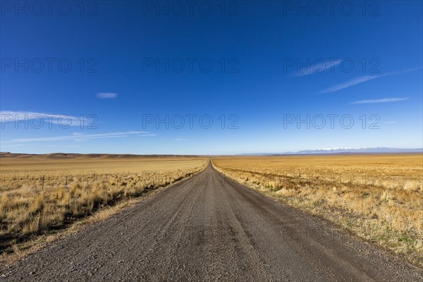 Empty desert road and blue sky