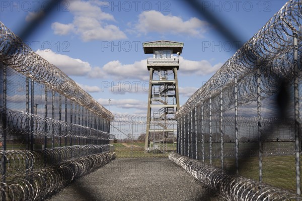 Tower and chainlink fence in prison