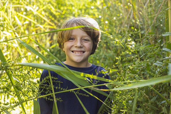 Outdoor portrait of happy boy