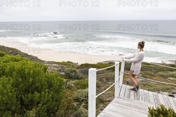 Girl looking at ocean view