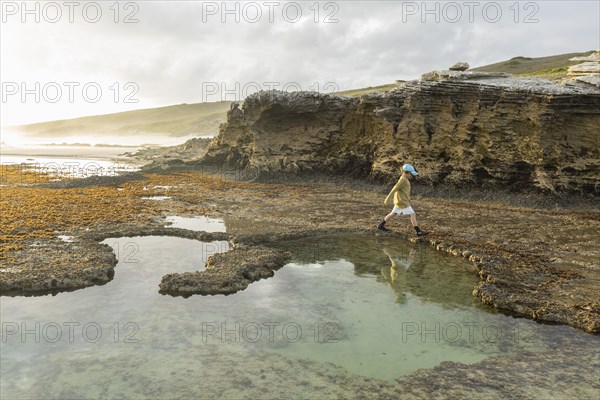 Boy exploring tidal pools