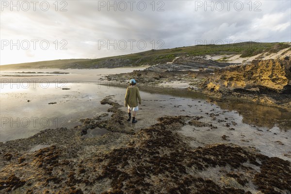 Boy exploring tidal pools