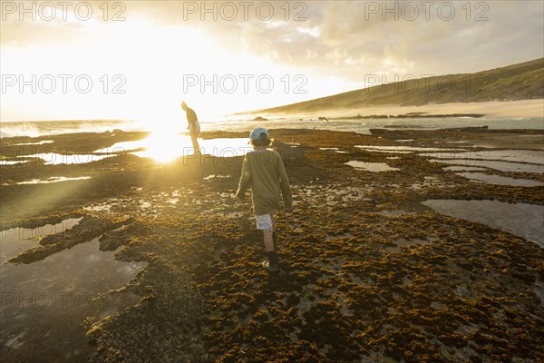 Boy and Girl exploring tidal pools