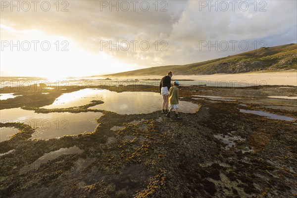 Boy and Girl exploring tidal pools