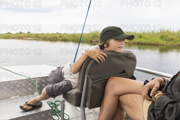 Boy in boat on Zambezi River