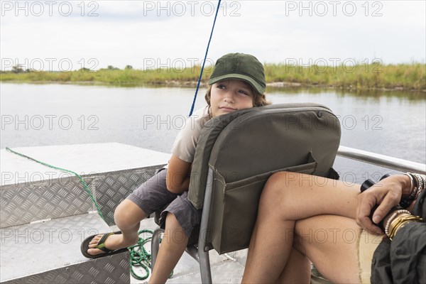 Boy in boat on Zambezi River