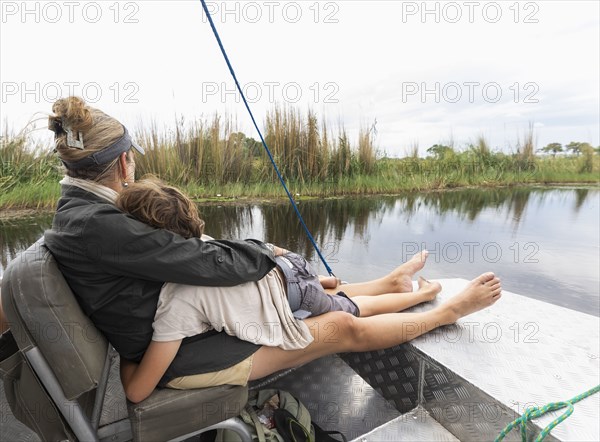 Mother and son in boat